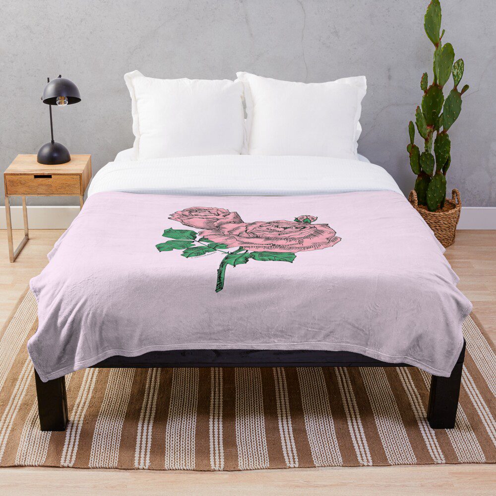 high-centered very full light pink rose print on throw blanket